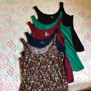5 No Boundaries tank tops.